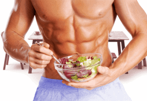 Effective weight loss diet for the real man 3 A muscular man eats a salad
