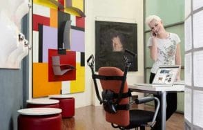 How to stay in shape while working in the office? 2 woman talking on the phone in the office