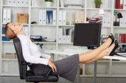 woman keeps her feet on the desk