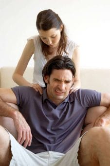 woman does a shoulder massage