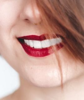  a woman with white teeth