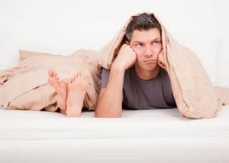 Semaxin - solves all male potency problems 2 A frustrated man in bed