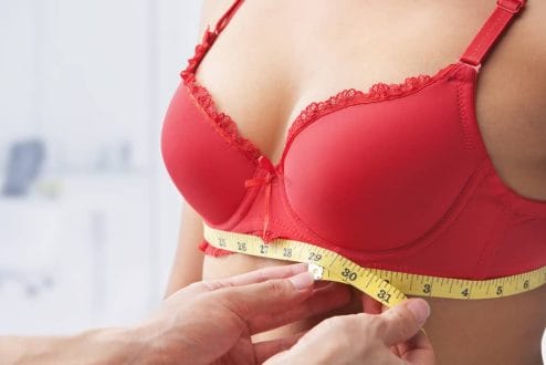  female breasts measured with a centimeter